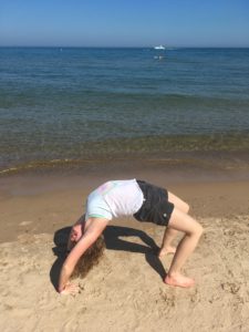 wheel pose loyola beach chicago bridges through life